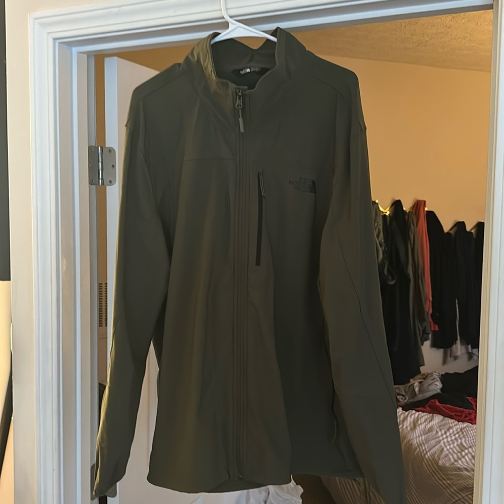 North Face Dark Green, LT weight jacket, XXL, but a smaller XXl. Excellent Con